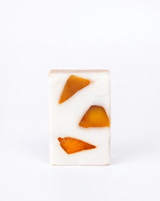 Herbaria Mango Mosaic soapbar on white background – vegan botanical bar with mango swirls.
